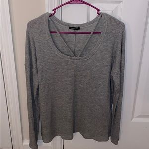 Gray long sleeved top